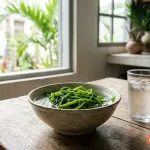 Nhổ răng xong có được ăn rau muống không? Kiêng bao lâu là đủ